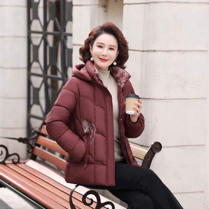 New Chinese-style cotton coat for mothers, solid color elegant women's clothing, winter 2025 new style, middle-aged and elderly women's warm cotton jacket.