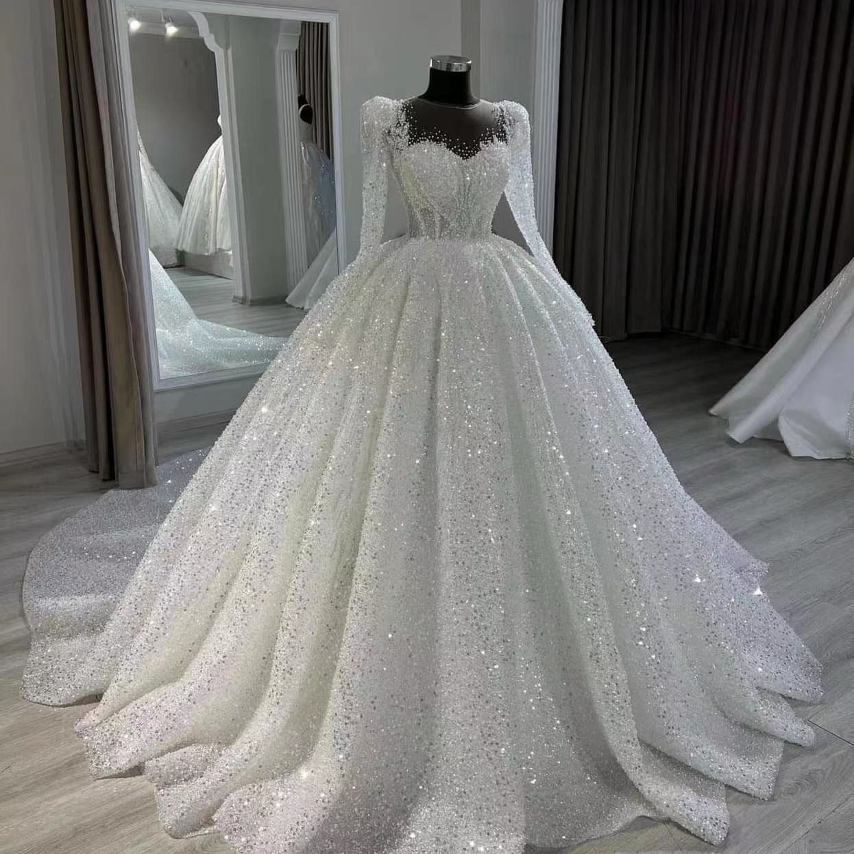 Luxurious Bridal Wedding Dress with Heavy Beaded Train, Long Sleeve Mermaid Silhouette, Sparkling Long Sleeve Gown