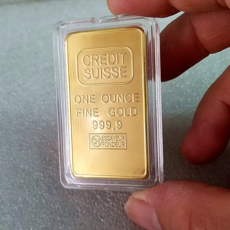 Replica coins in gold bar box