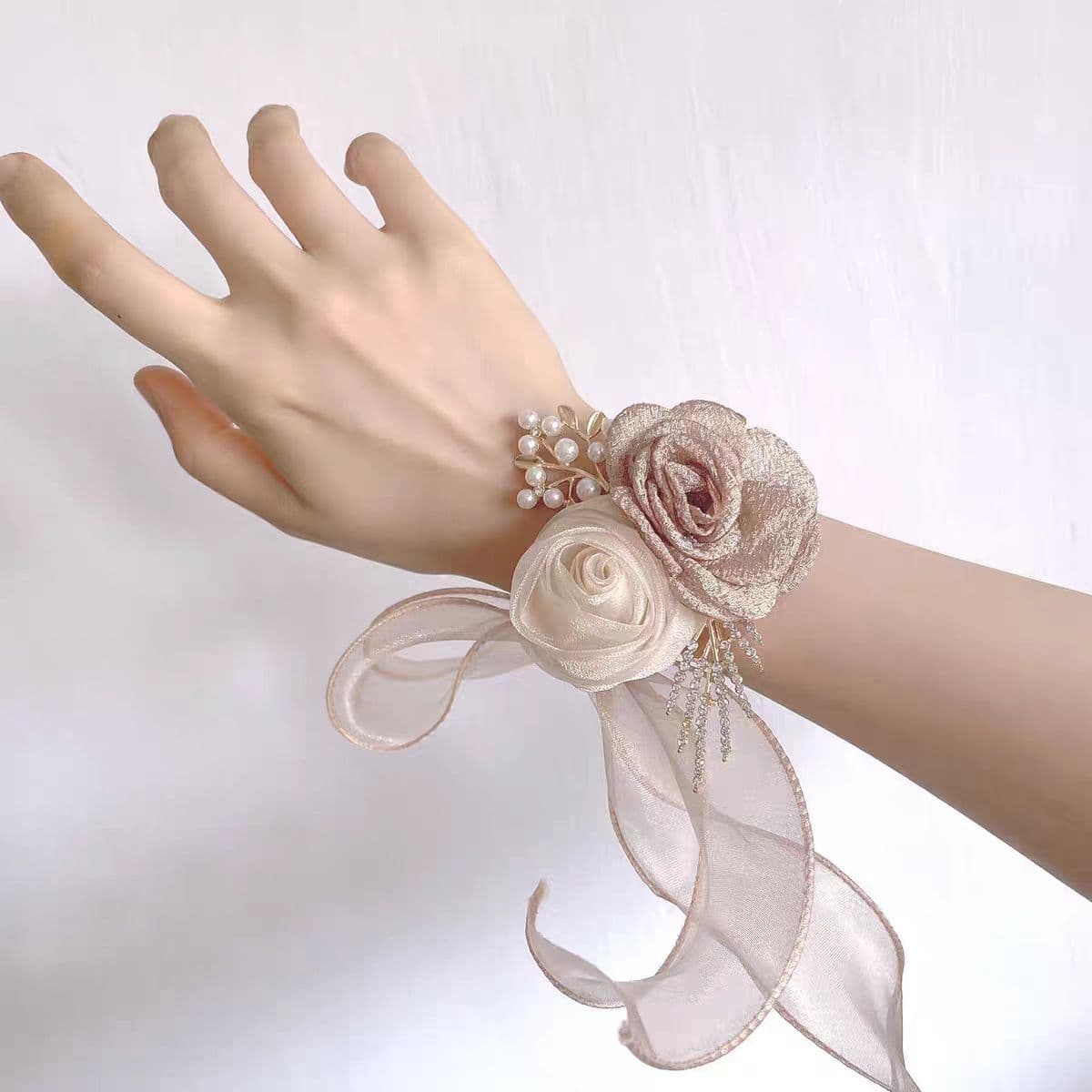 New wedding bridal and bridesmaid wrist flowers, double-strand pearl chain wholesale, various boutonnieres and wedding floral materials.