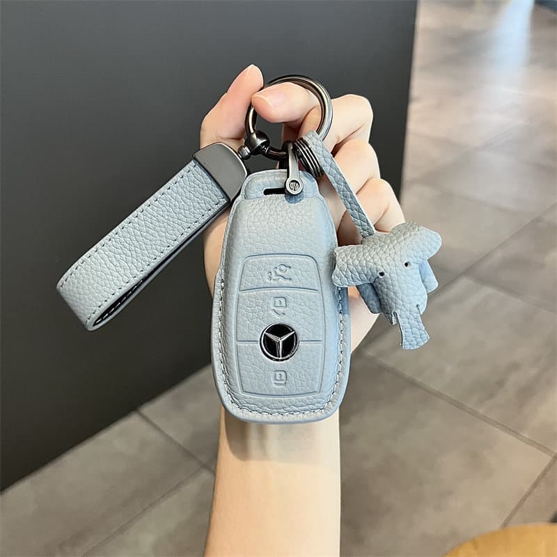 Suitable for Mercedes-Benz e300l key cover c260l car a200l glcglb220 gle350 buckle cla200 genuine leather
