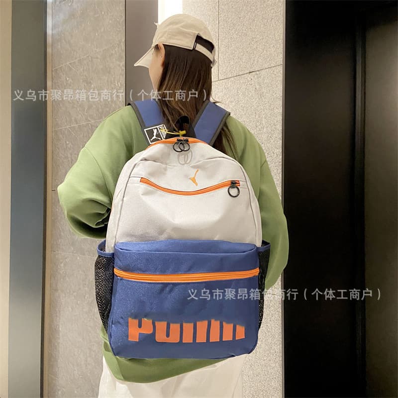 New student schoolbags trendy brand logo fashionable casual lightweight junior high school and high school schoolbags large capacity trendy travel backpack