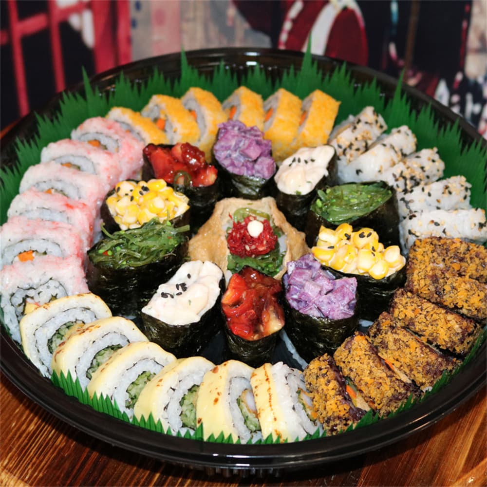 Disposable large disc round banquet tray fruit plate plastic sushi packaging box large plate factory wholesale