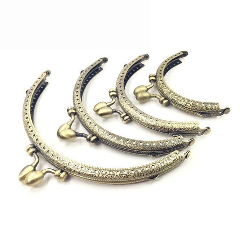 kiss lock factory direct sales embossed process curved mouth gold with hole design DIY handbag coin purse accessories