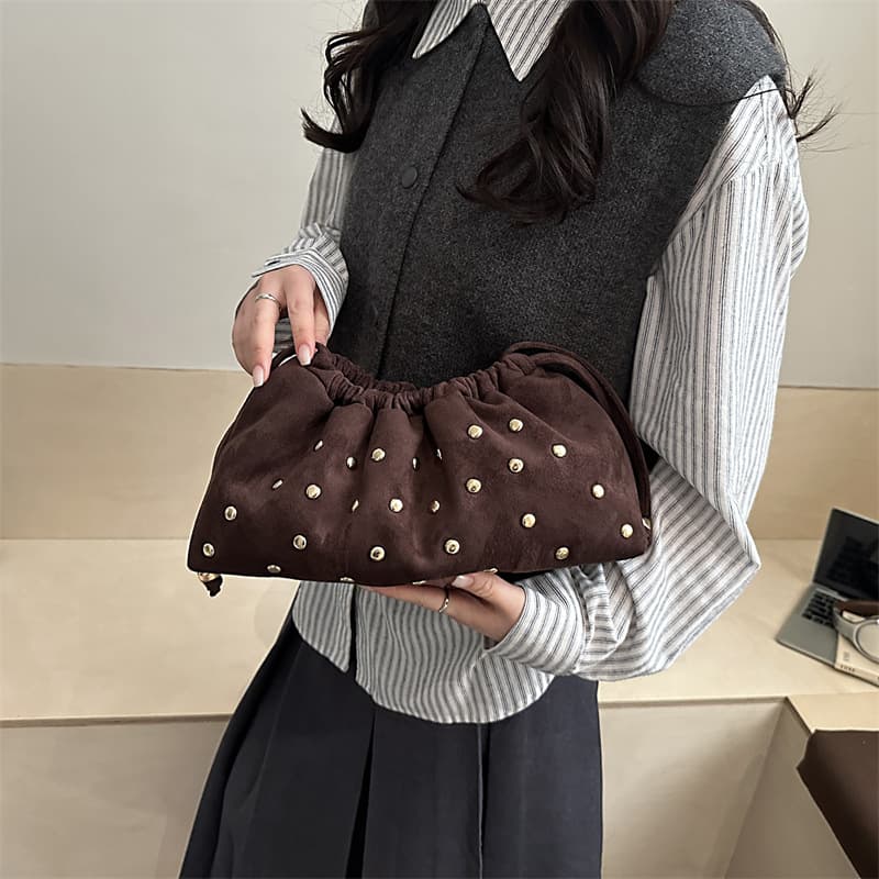 Niche frosted rivet handbag women's 2026 spring and summer retro style simple casual versatile hand bucket bag