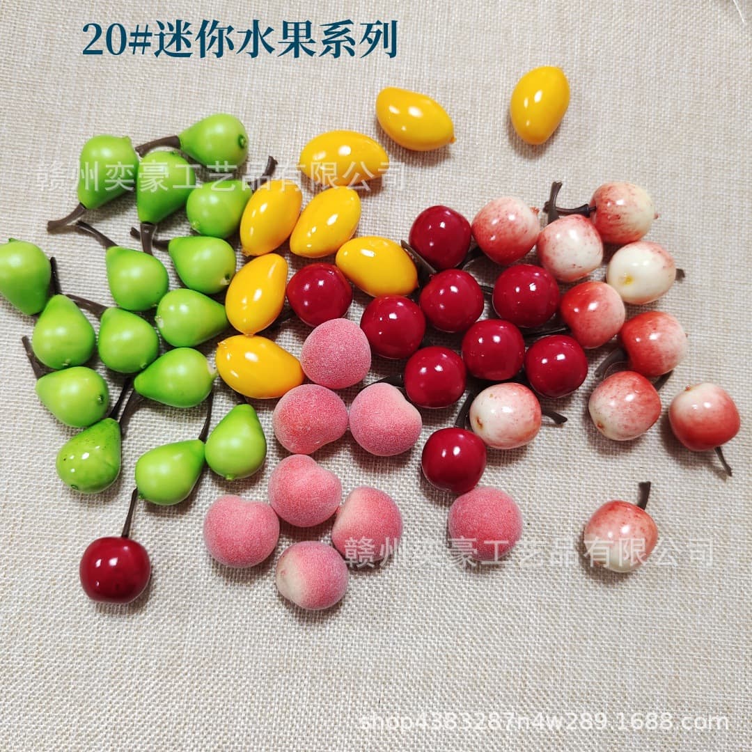 Factory direct sales wholesale of miniature realistic fruit models, including apples, pears, mangoes, pomegranates, and peaches.