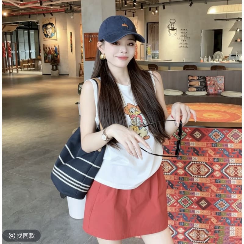 Xiaoxi Korean style super good-looking and relaxed outfit, a complete set of women's summer cartoon vest casual short skirt two-piece suit