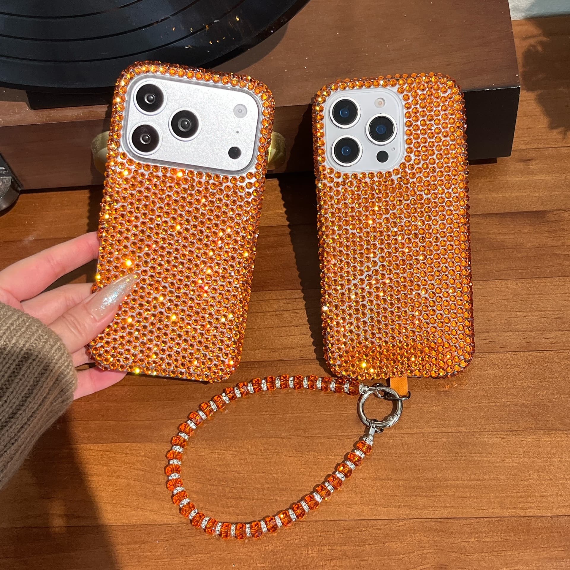 Orange Crystal Full Rhinestone iPhone 14 15 16 17 Pro Phone Case with Sparkling Diamond Lanyard, Luxury Glossy Shockproof
