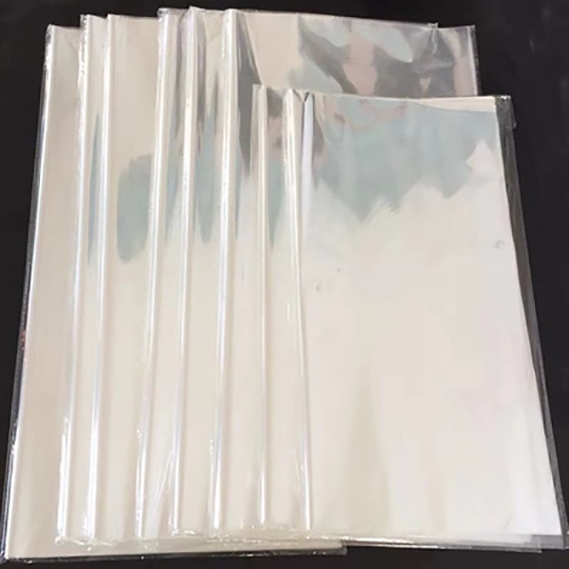 Transparent wrapping paper for flowers, cellophane, and plastic that allows light to pass through.
