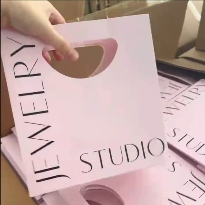 Paper bag customization High quality environmentally friendly luxury paper bag with hand cut design wholesale with LOGO