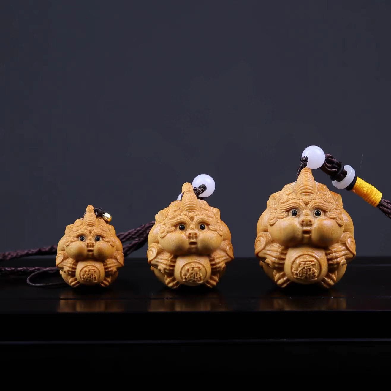 Boxwood Carved Fortune Attracting Handpiece, Pixiu Holding Ball Solid Wood Scholar's Ornament Chinese-style Wealth Charm Plump Pikachu