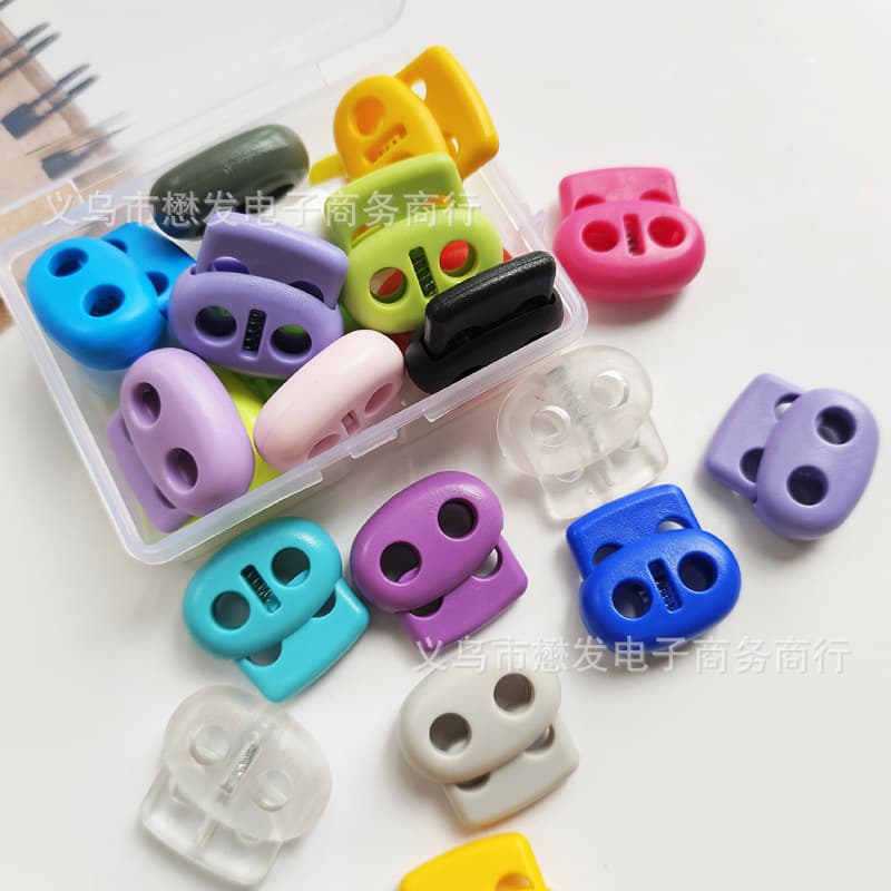 24 colors available from Hualian KAM colored plastic cord loops, POM spring buckles, double-hole adjustable buckles, and pig nose buckles.