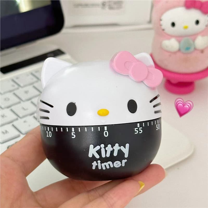 Cute cat student rotating self-study time manager, mechanical timer for cooking kitchen countdown