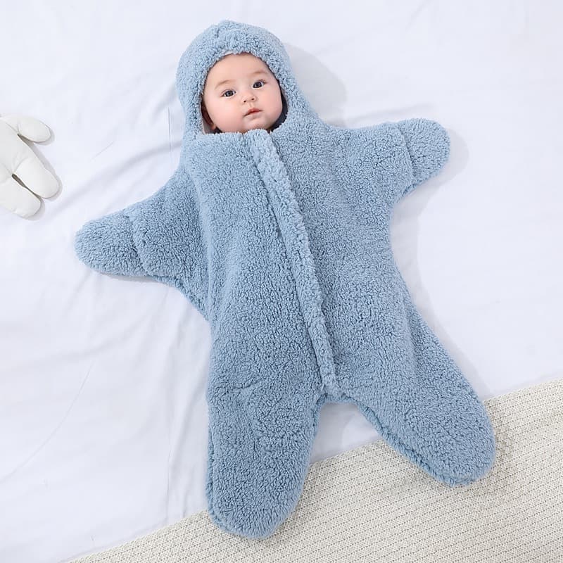 Thick winter baby swaddle blanket for newborns and infants, designed to prevent startle reflexes when out and about.