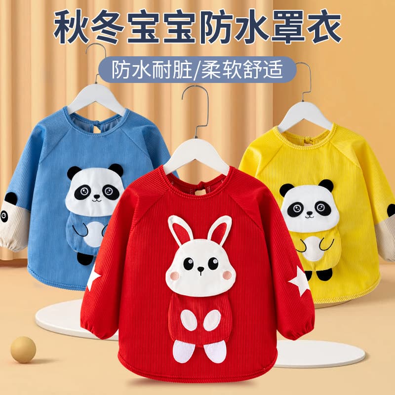 Unisex children's waterproof smock with reverse wear design for autumn/winter, featuring meal bib and apron functionality