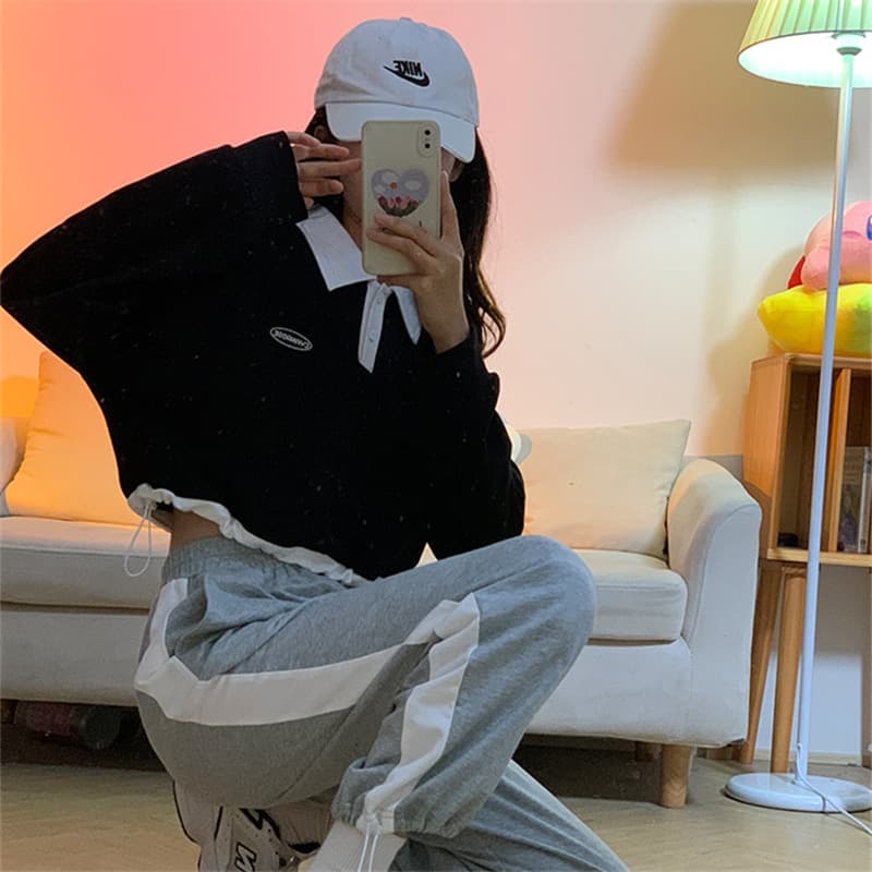 Sweet and cool polo collar long-sleeved waist sweatshirt for women spring new Korean style loose design niche top with trendy temperament
