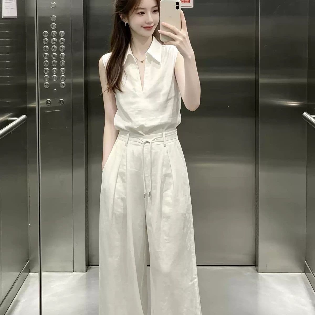 White Lapel Simple Versatile Sleeveless Vest Shirt Women's 2026 Summer French Commuting Relaxation Versatile Suit