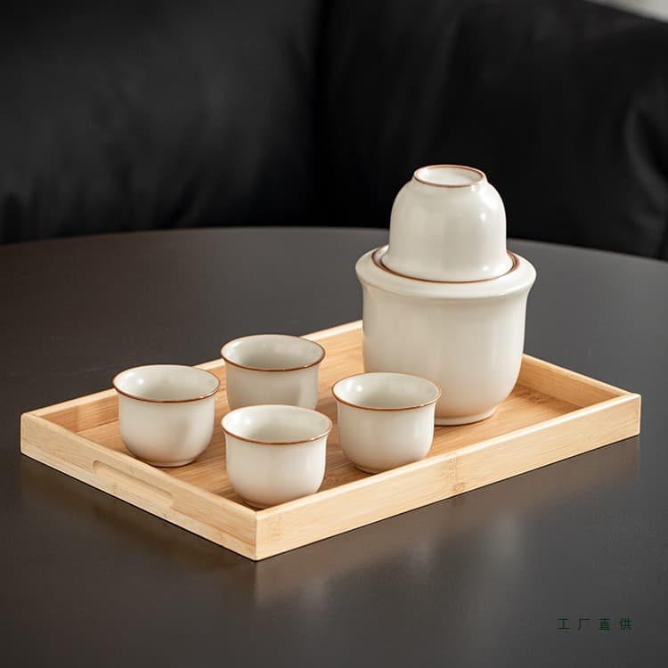 Ru kiln-style wine warmer, classic Chinese design for home use with ceramic cups for white and yellow rice wines.