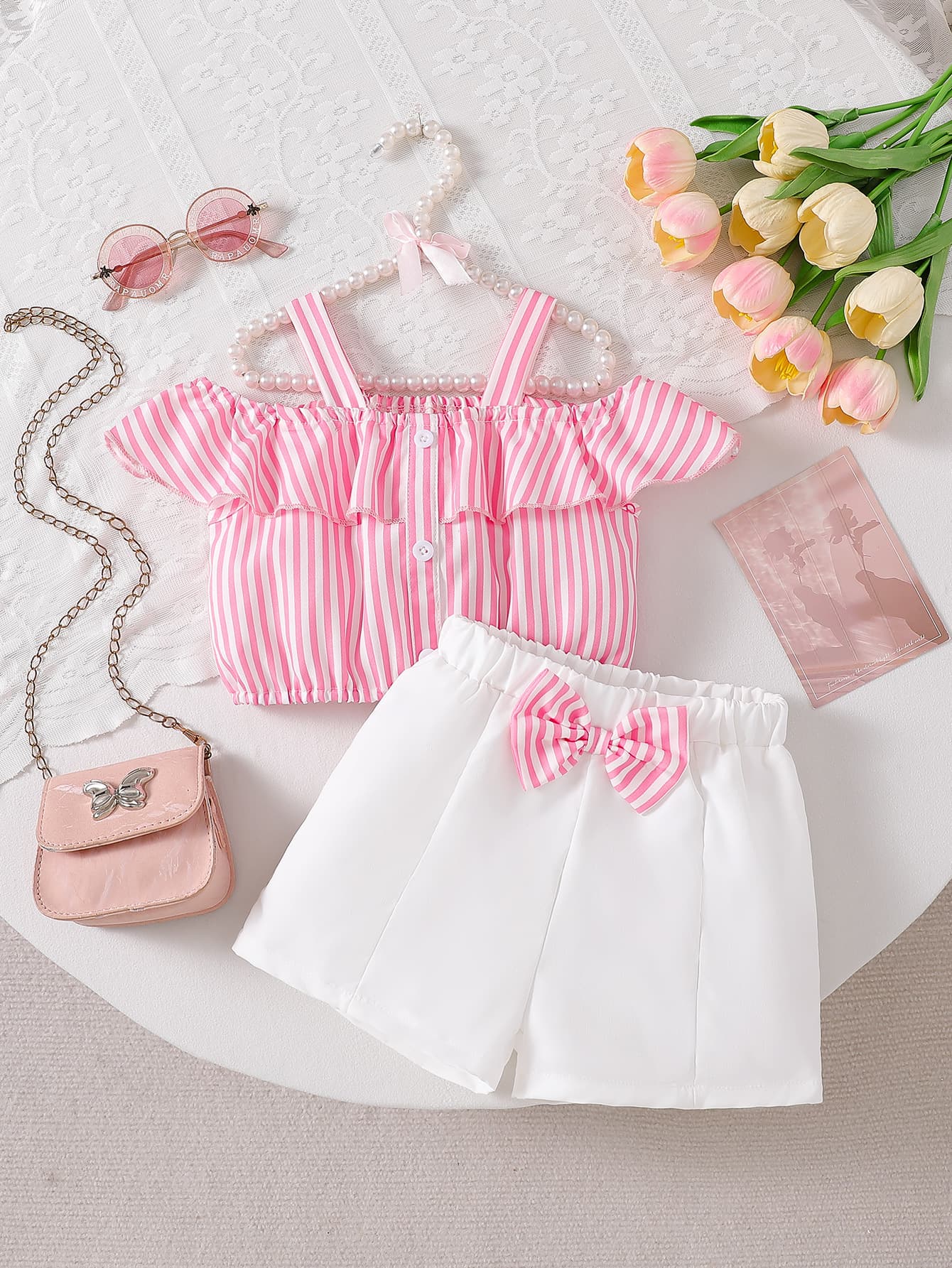 Girls pink striped halter top with lotus leaves, white bow shorts two-piece set, summer children's sweet suit trendy