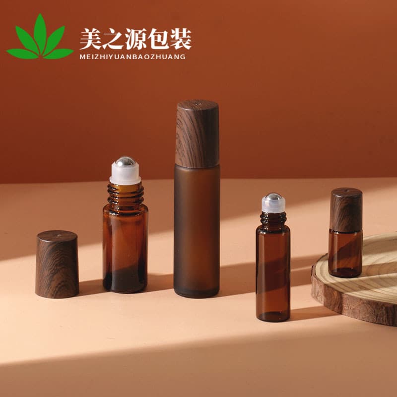 Wholesale wood grain cover 3ml brown roller ball bottle 5ml rolling ball essential oil bottle 10ml sub-bottle 2ml glass perfume bottle