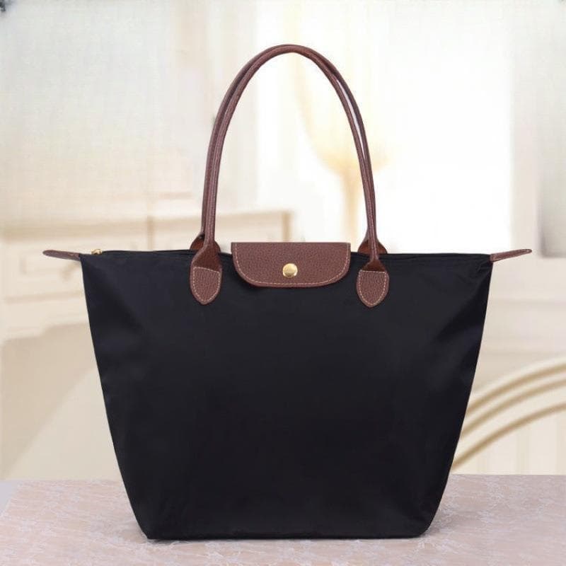 Women's single shoulder handbag, dumpling bag, travel storage bag, foldable shopping bag, suitable for mothers and women.