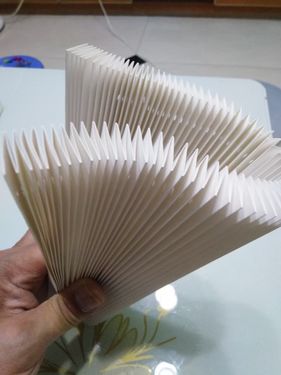 Accordion origami. Paper folding. Telescopic paper folding. Machine origami.