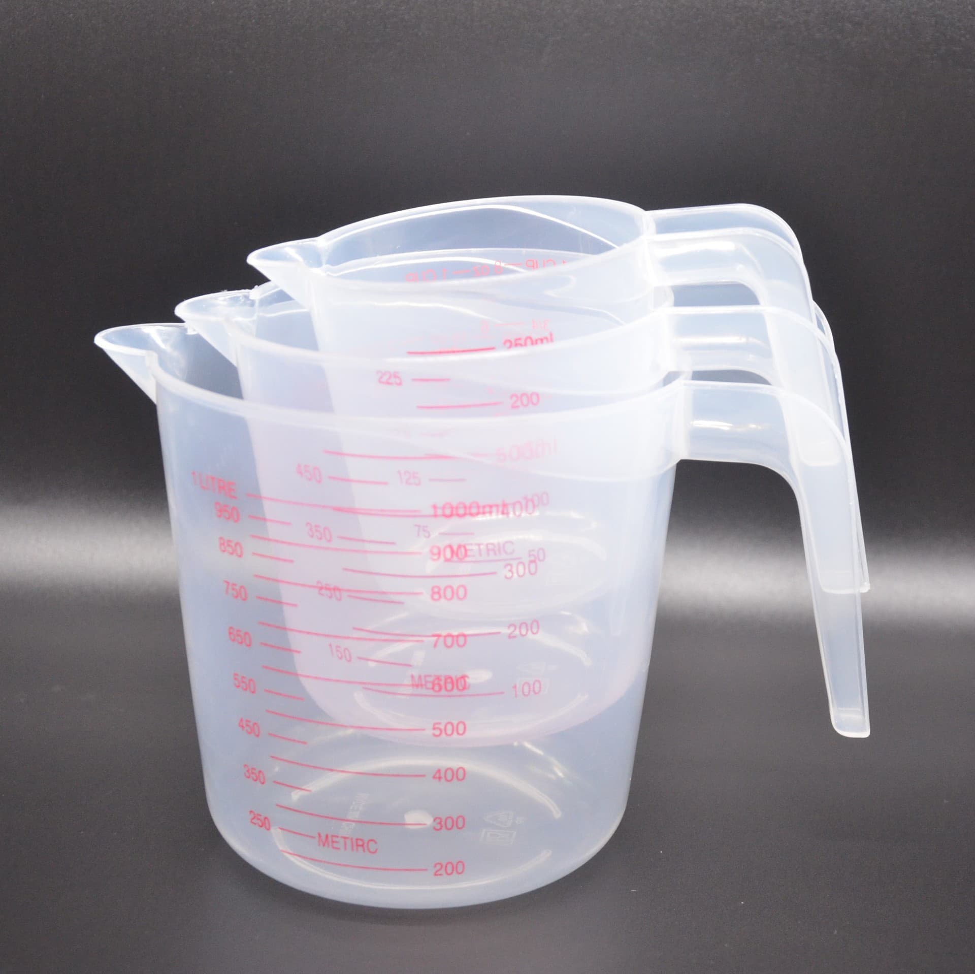 250g high-transparency plastic measuring cup with graduations; 500g measuring cup; 1000g kitchen baking measuring tool; measuring spoons.