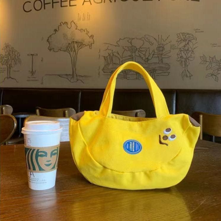 Cute and playful banana-shaped embroidered canvas bag, a convenient tote bag for office workers and mothers.