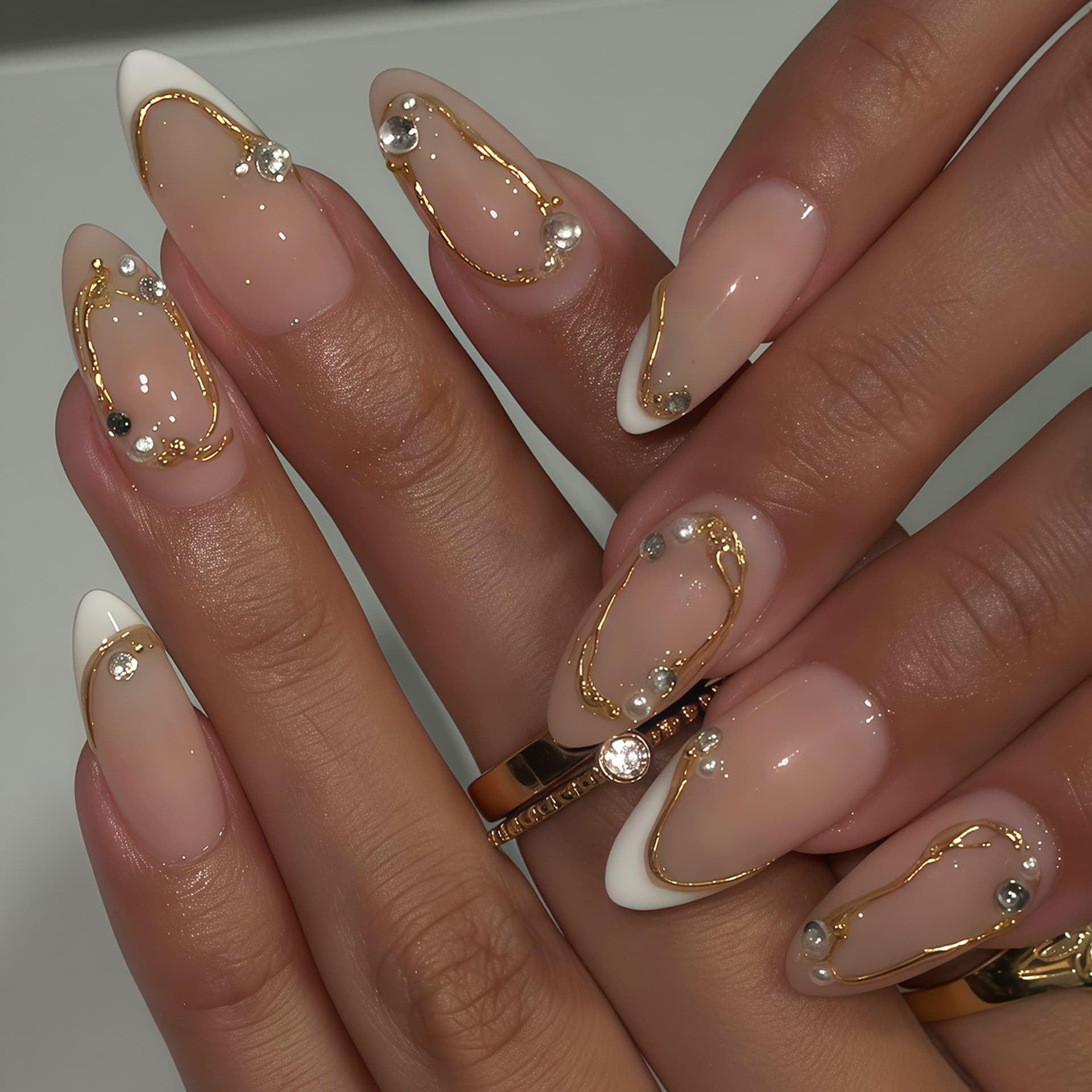 3D three-dimensional French wear nails, almond manicure, fashionable white French gold stripes, cute pearl design
