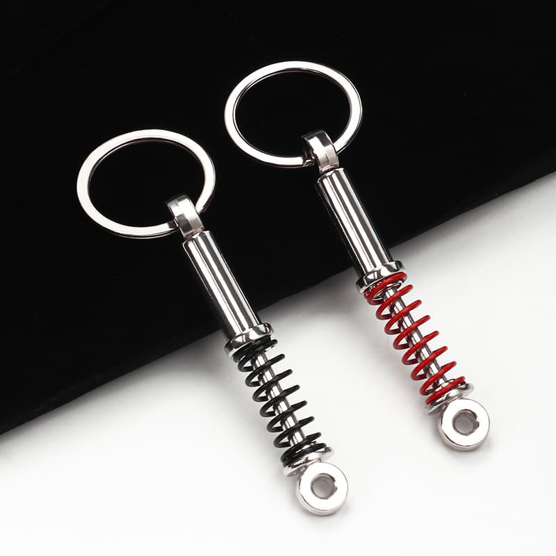 Wholesale popular creative metal modified shock absorber model pendant decompression artifact car shock absorber key chain