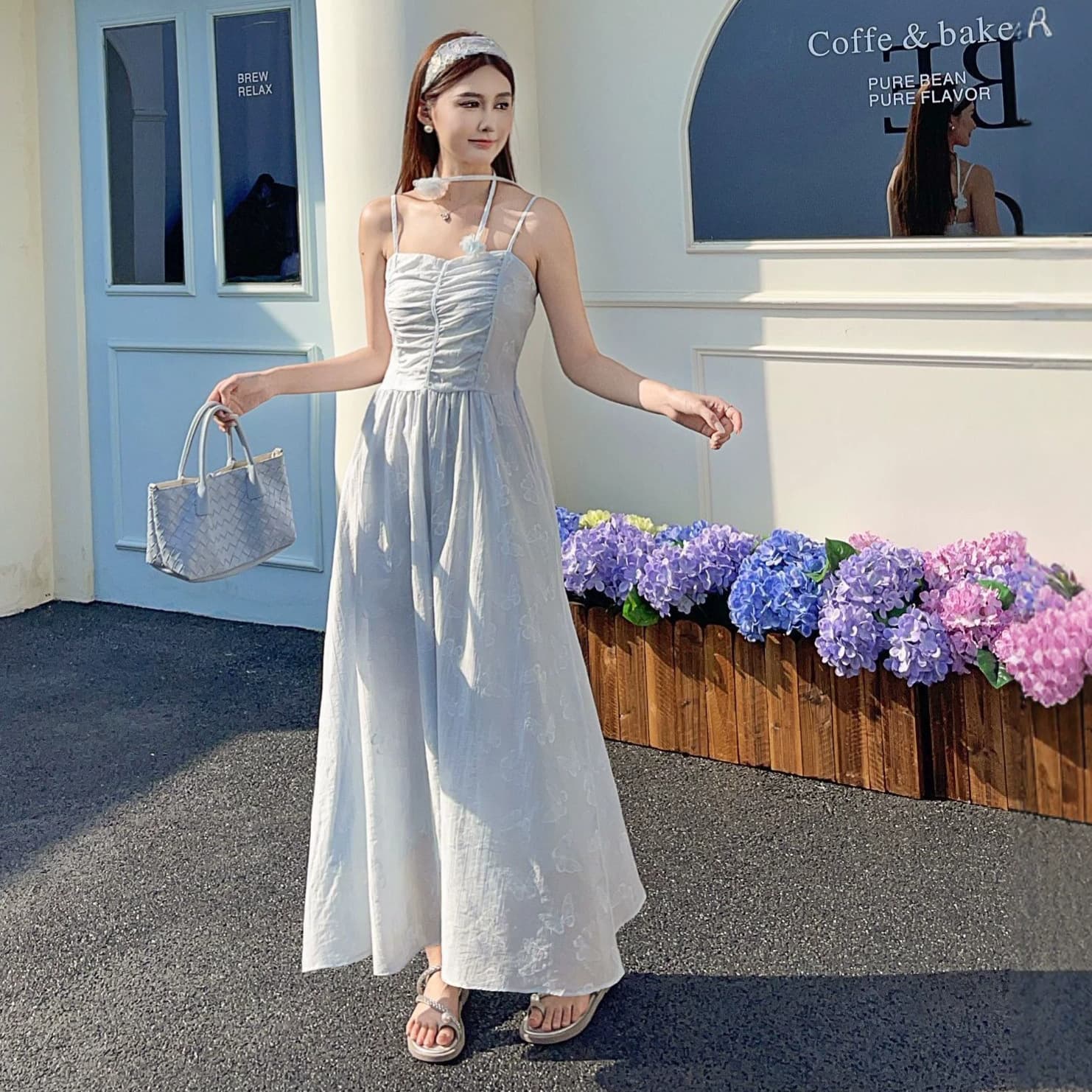Sling waist dress women's summer new fresh and sweet long skirt vacation style beach skirt solid color A-line skirt