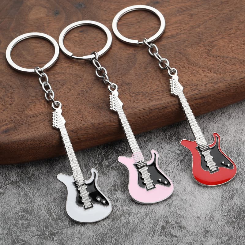 Cross-border in stock Wholesale Creative Musical Instrument Pendant Activity Gift Bag Hanging Metal Paint Guitar Keychain