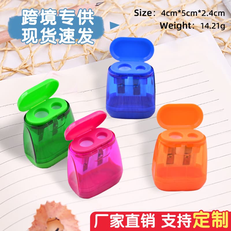 Double-hole shaped small pencil sharpener elementary student plastic handheld sharpener cute sketching sharpener wholesale