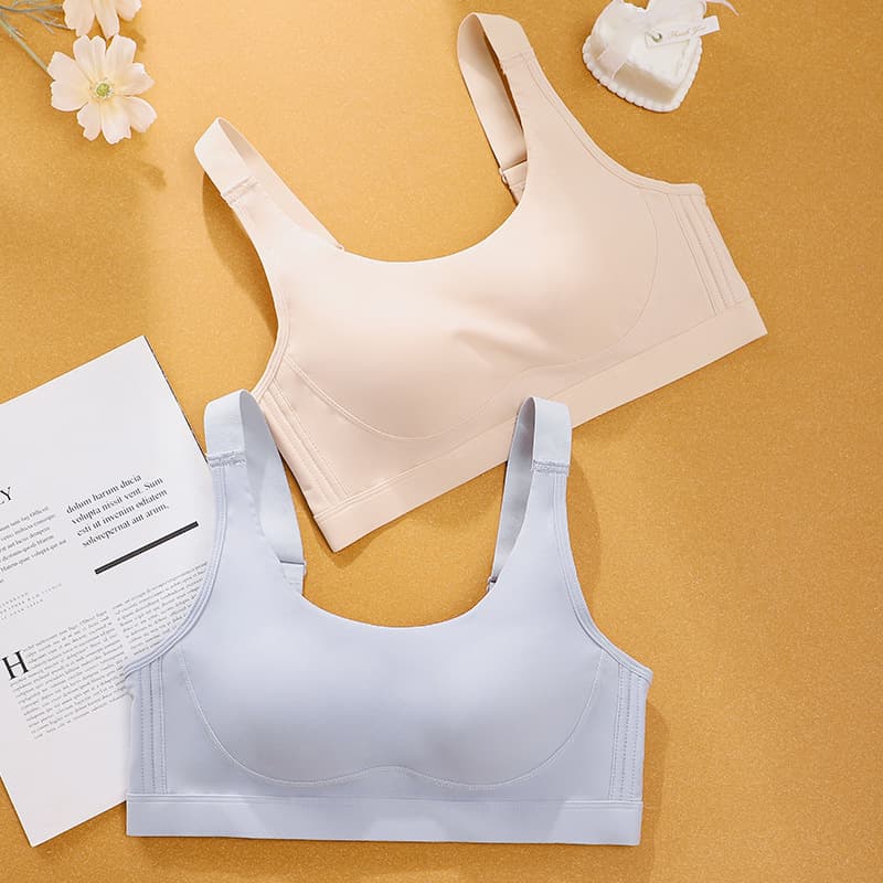 Women's bra that enhances bust size, pushes up and supports side breasts, vest style, wire-free, fixed cup, suitable for teenage students and sports.