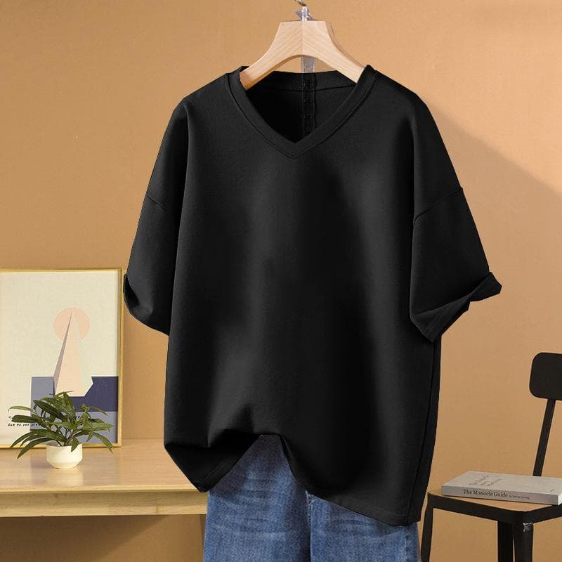 Plus-size, loose-fitting, chic solid color, white V-neck top for women, perfect for summer.