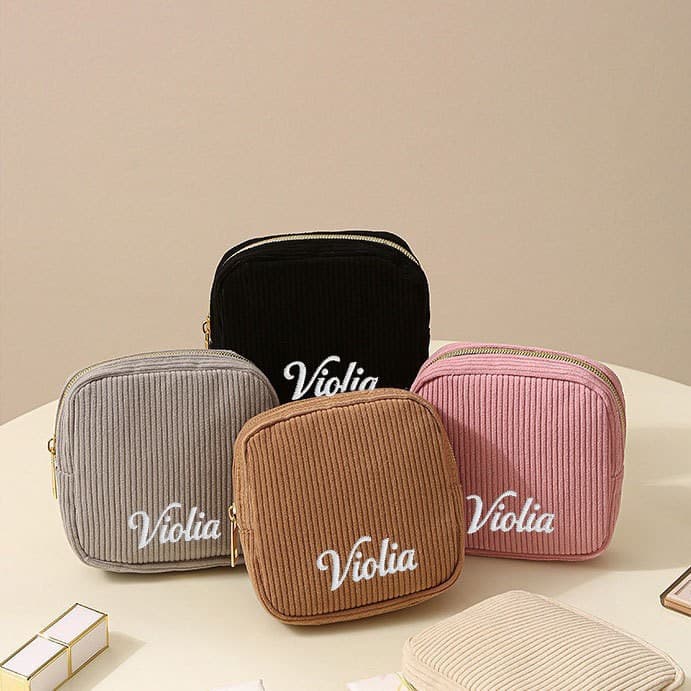 etsy's best-selling embroidered seersucker striped makeup bag, simple, portable, trendy, and popular among young women.