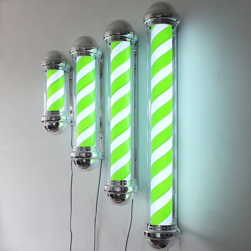 Cylindrical wall-mounted trendy green LED beauty salon/hairdressing shop rotating light, waterproof and sun-proof, outdoor use.