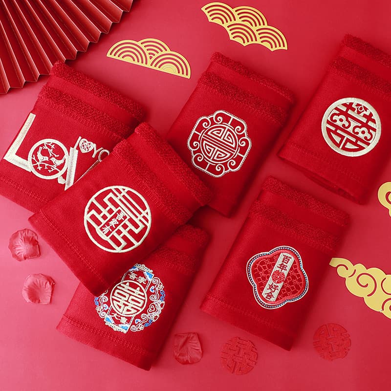 Wholesale burgundy wedding towels made of bamboo fiber with embroidered double happiness, creative, soft, and absorbent for couples.