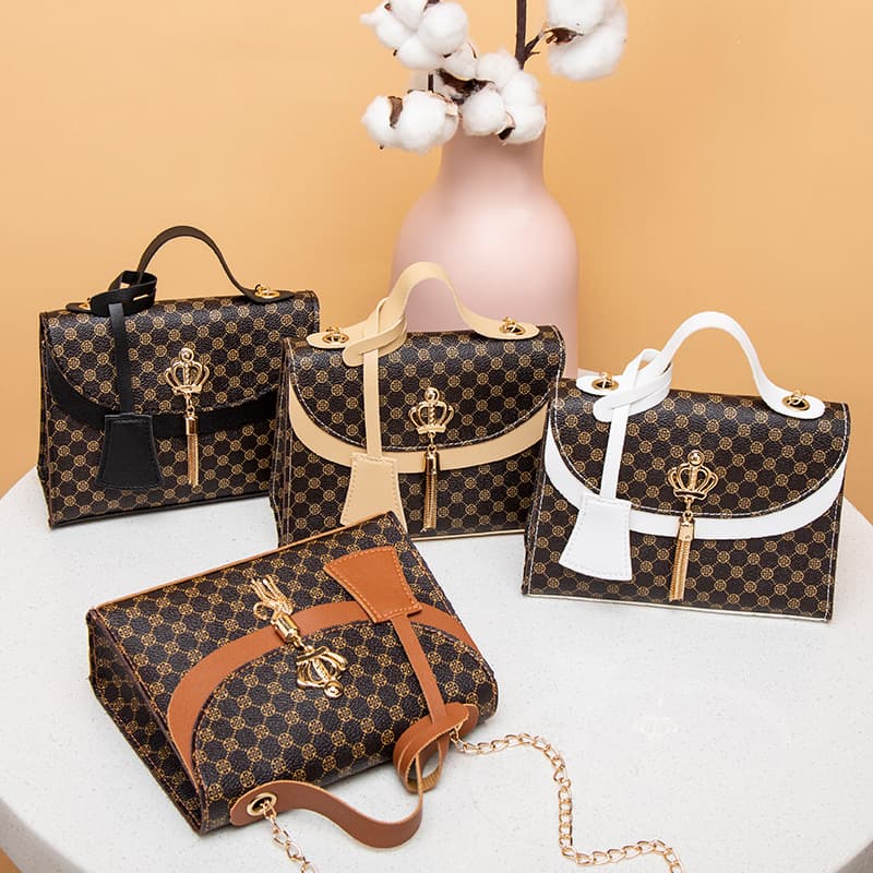 Classic printed light luxury women's bag, metal crown pendant, contrasting color portable chain bag, daily travel crossbody small bag