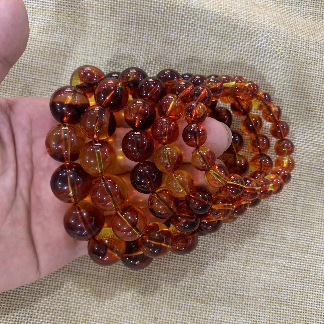 Factory wholesale blood silk amber beeswax amber bracelet fluorescent floating salt water second generation amber beeswax bead bracelet live broadcast