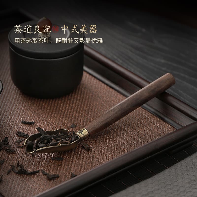 Manufacturer of ebony alloy tea spoons, tea scoops, tea shovels, tea ladles, Kung Fu tea sets, tea ceremony accessories; logo supported.