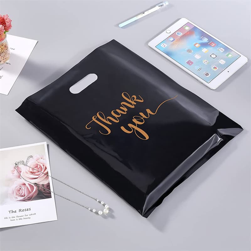 Ready-to-ship cross-border gratitude golden "thank you" four-finger bags, polyethylene plastic clothing bags, hand-held gift shopping bags