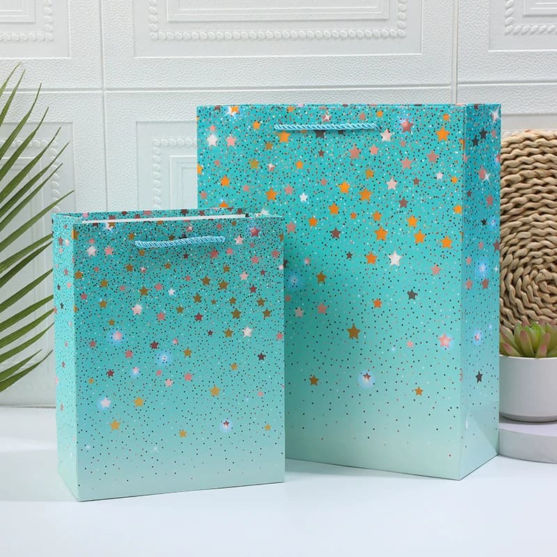 New five-pointed star handbag blue paper gift bag hot stamping craft clothing bag blue gift bag exclusively for cross-border supply
