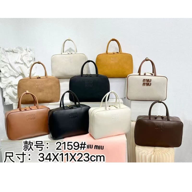 2025 New Miu Miu Bowling Briefcase Bag Single Shoulder Handheld Vintage Versatile Casual Long Handle Handbag for Women