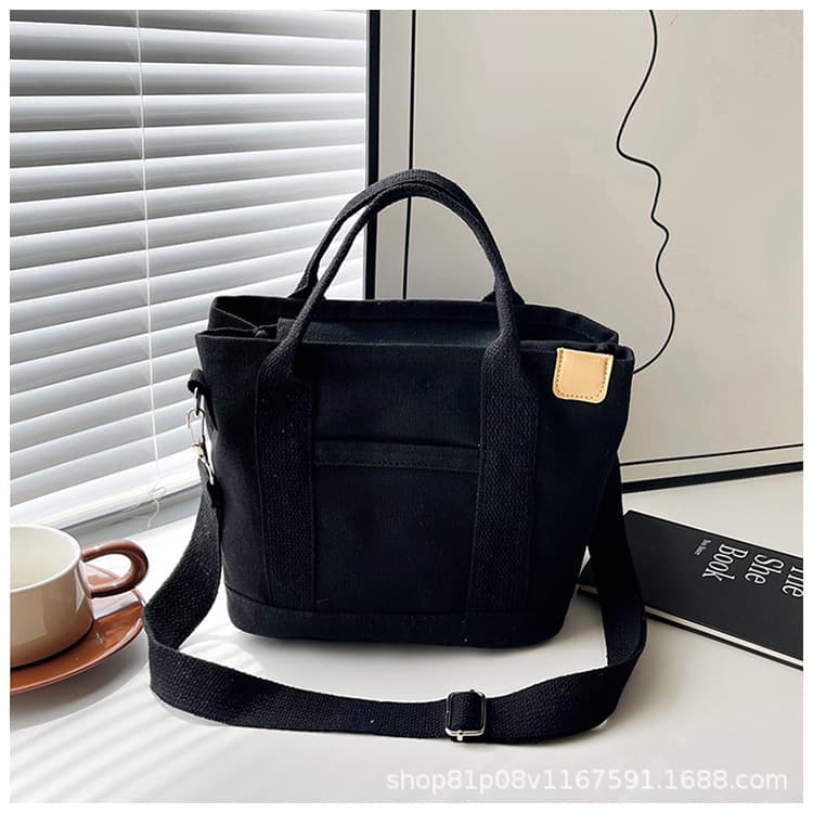 New versatile women's canvas tote bag, large capacity, single shoulder/handbag, eco-friendly shopping bag, casual and artistic canvas bag.