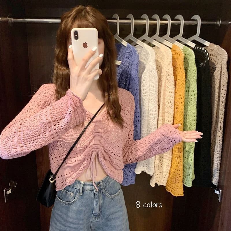 Xiaoxiangxiang Hollow V-Neck Long-Sleeve Knit Top Women's 2026 New Spring/Fall Thin Loose Drawstring Sun Protection Blouse
