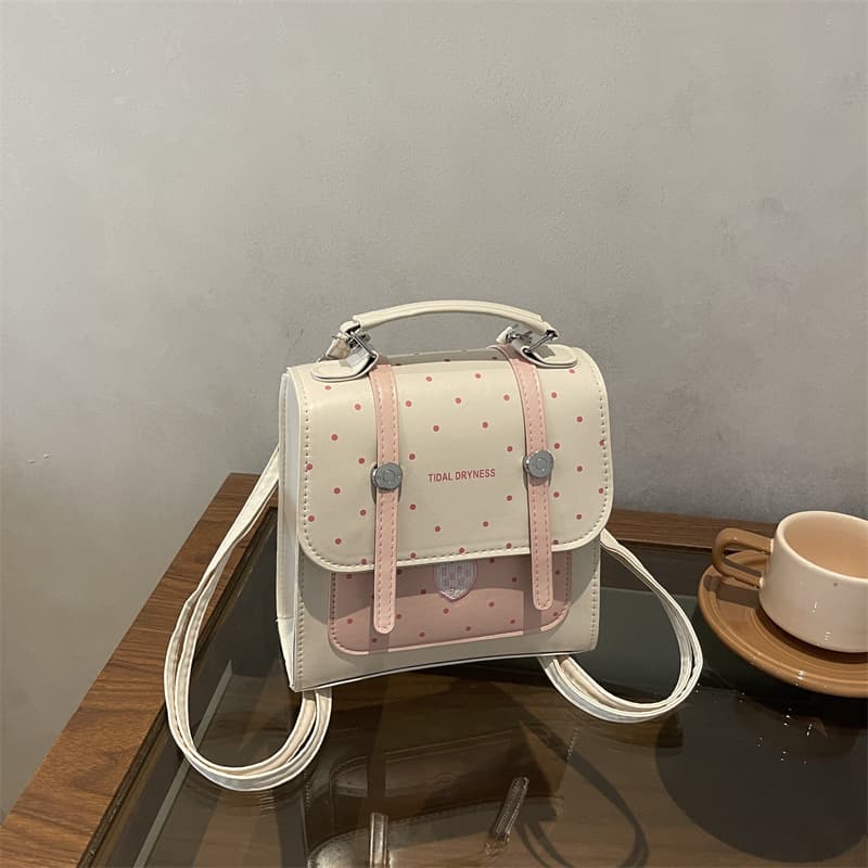 Simple Korean style niche backpack for women 2026 new fashion versatile portable polka dot backpack student school bag