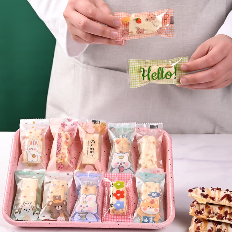 2026 New Nougat Machine Sealing Bag Toffee Candy Paper Baking Packaging Cute Cartoon Candy Packaging Bag Wholesale
