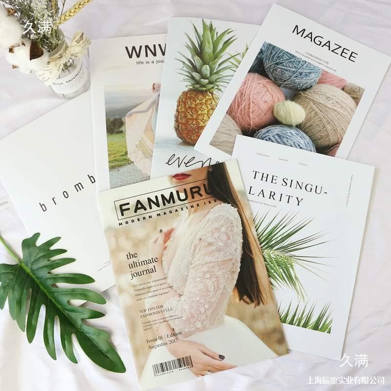 European and American style magazines, street photography with books in hand, cool style, personalized photo background, clothing, still life photo props