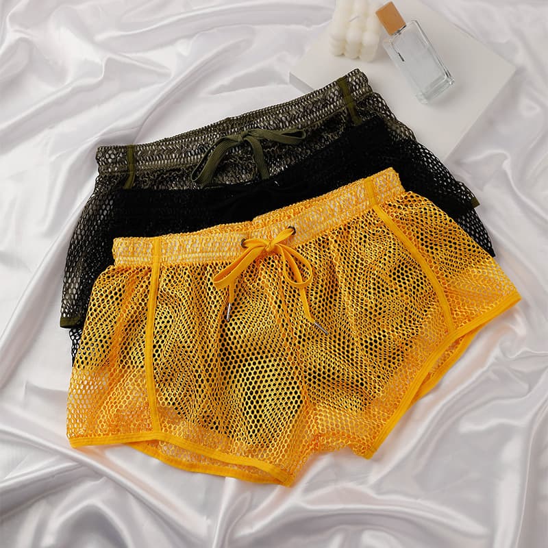 New mesh men's Arrow pants boxer briefs breathable sexy home shorts men's hollow transparent loose underwear